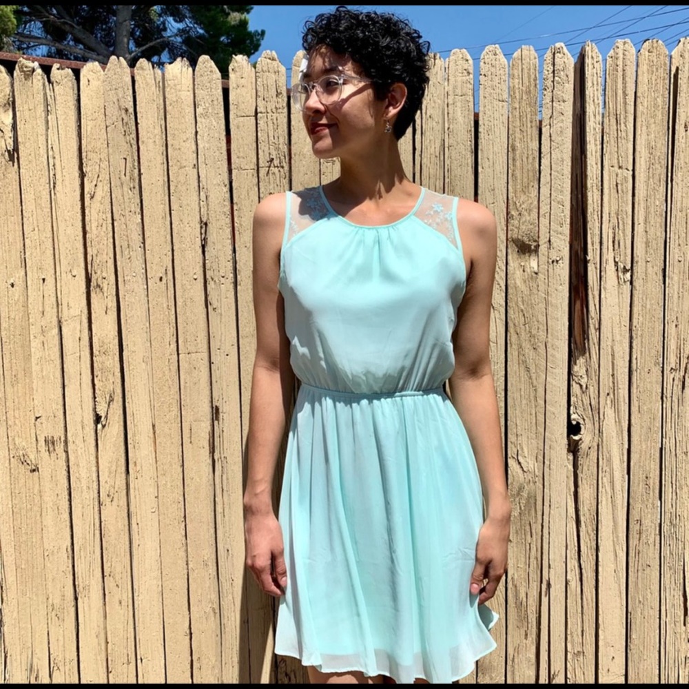 Blue flowy dress with button-up back